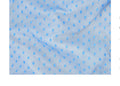 Light blue sheer mesh fabric with a repeating pattern of small medium-blue polka dots, shown with soft folds.