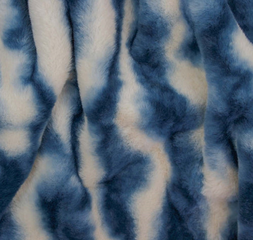 Blue and white tie-dye faux fur fabric with a soft, plush texture.